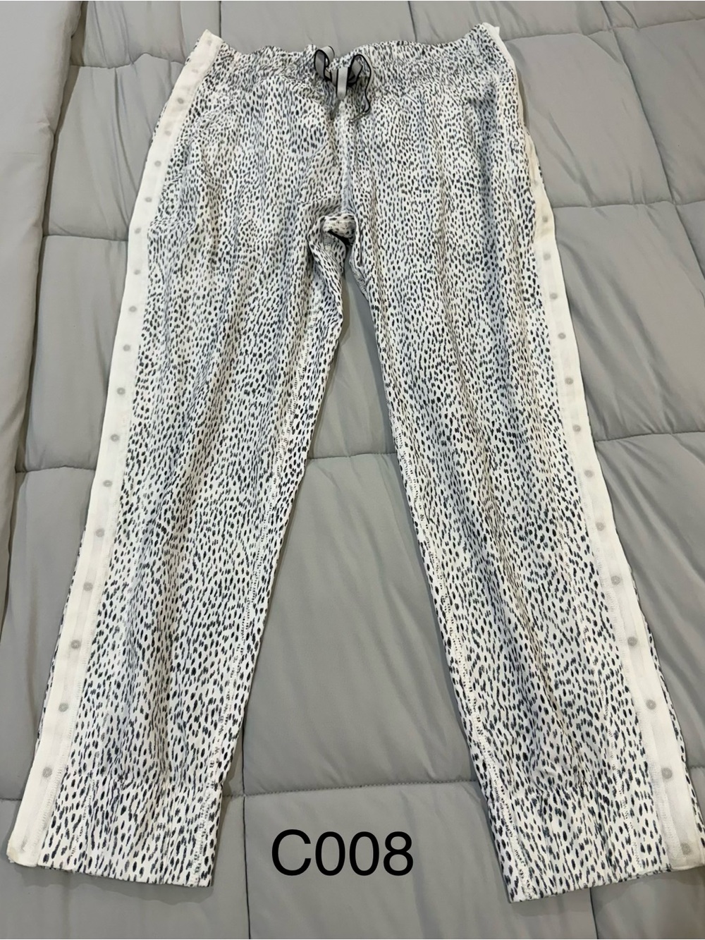 lululemon athletica White Jeans with Black Speckle Print and Side Snap Panels